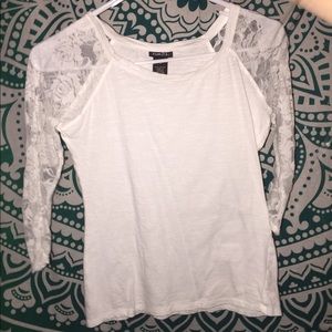 A white lace sleeved shirt